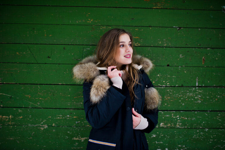 Beautiful brunette girl in winter warm clothing